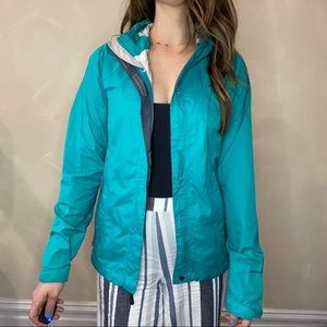 Teal North Face Rain Jacket with white patterned gortex lining size X Small | XS